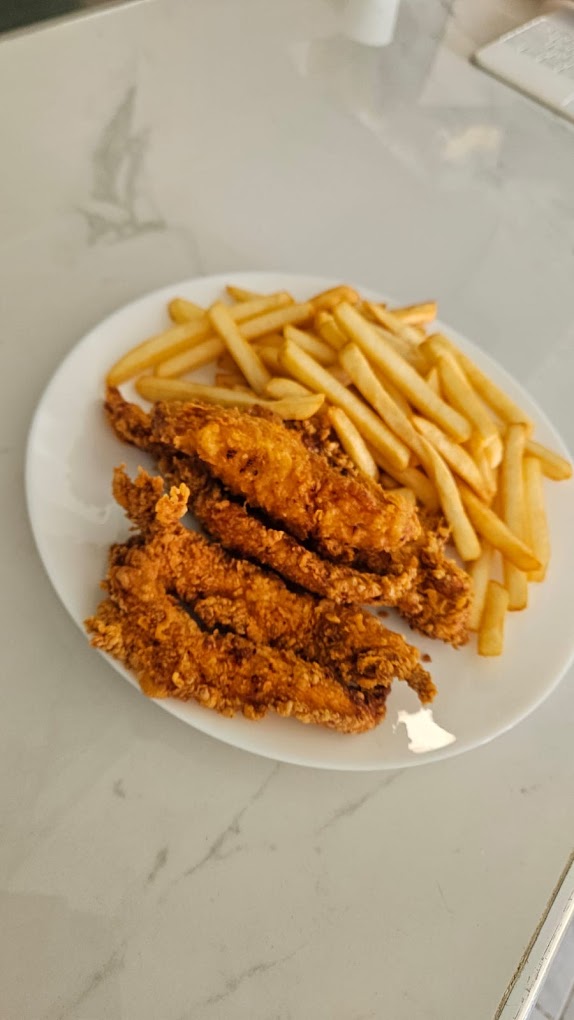 Crispy chicken tenders with fries