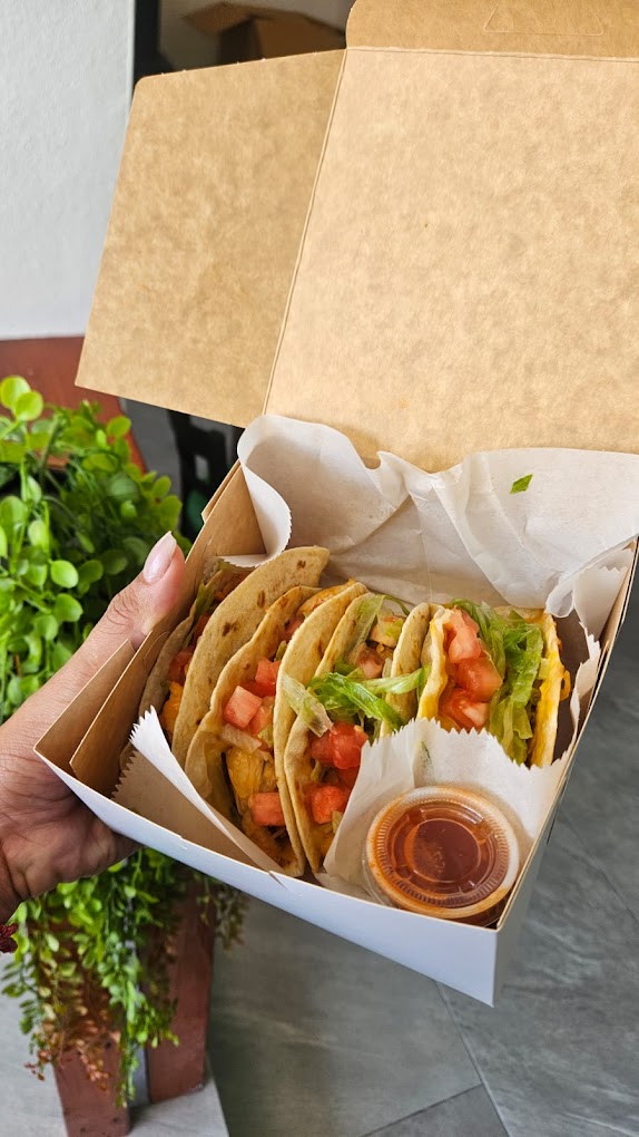 Tacos served in a to-go box at Don Guillermo
