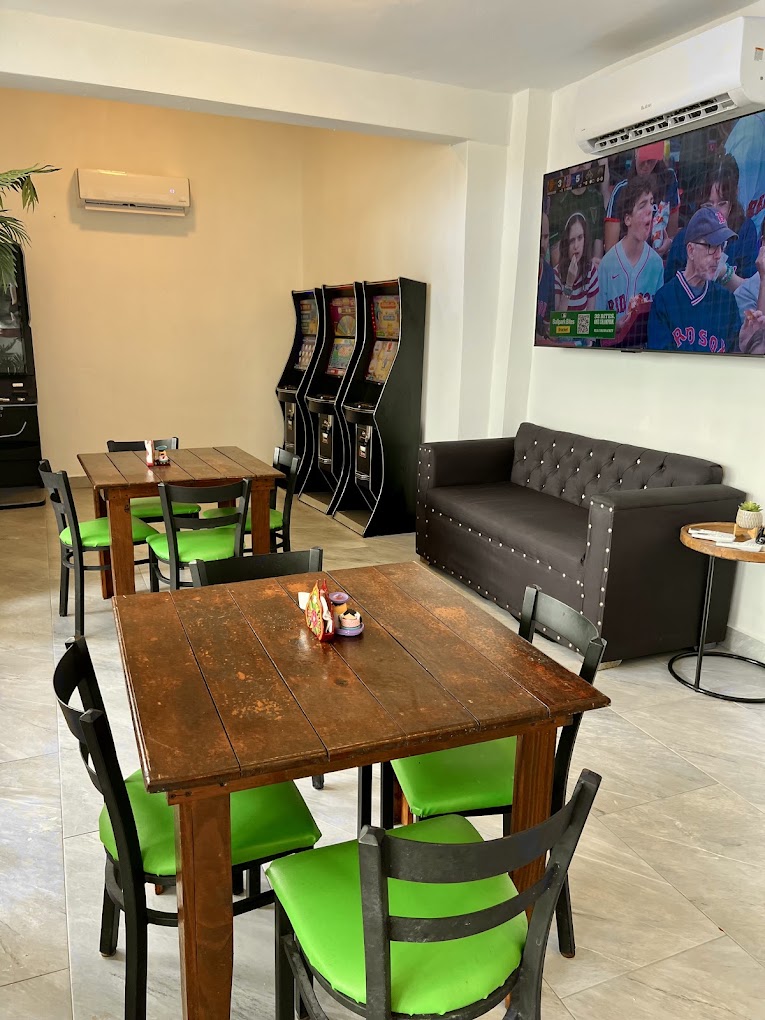 Don Guillermo dining room interior with lime-green seating